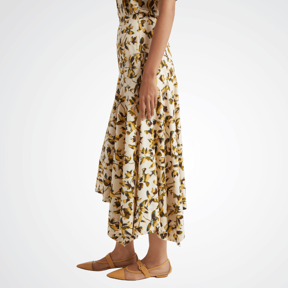 Ulla Johnson Annika High Waist Asymmetrical Midi Skirt in Lucent – luxury cotton poplin graphic bloom midi skirt with asymmetric hem, Available instore and online at Riada Concept, Woollahra Sydney’s destination for a curated selection of international luxury brands