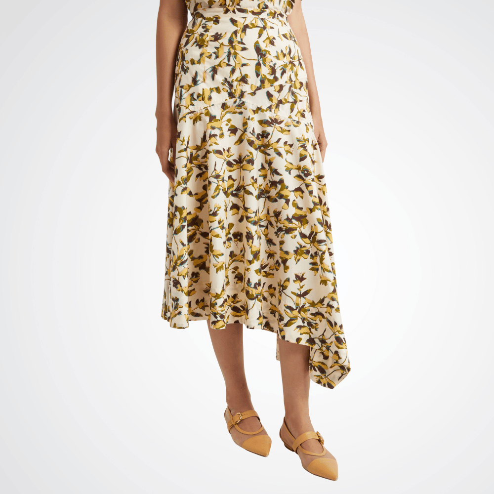 Ulla Johnson Annika High Waist Asymmetrical Midi Skirt in Lucent – luxury cotton poplin graphic bloom midi skirt with asymmetric hem, Available instore and online at Riada Concept, Woollahra Sydney’s destination for a curated selection of international luxury brands