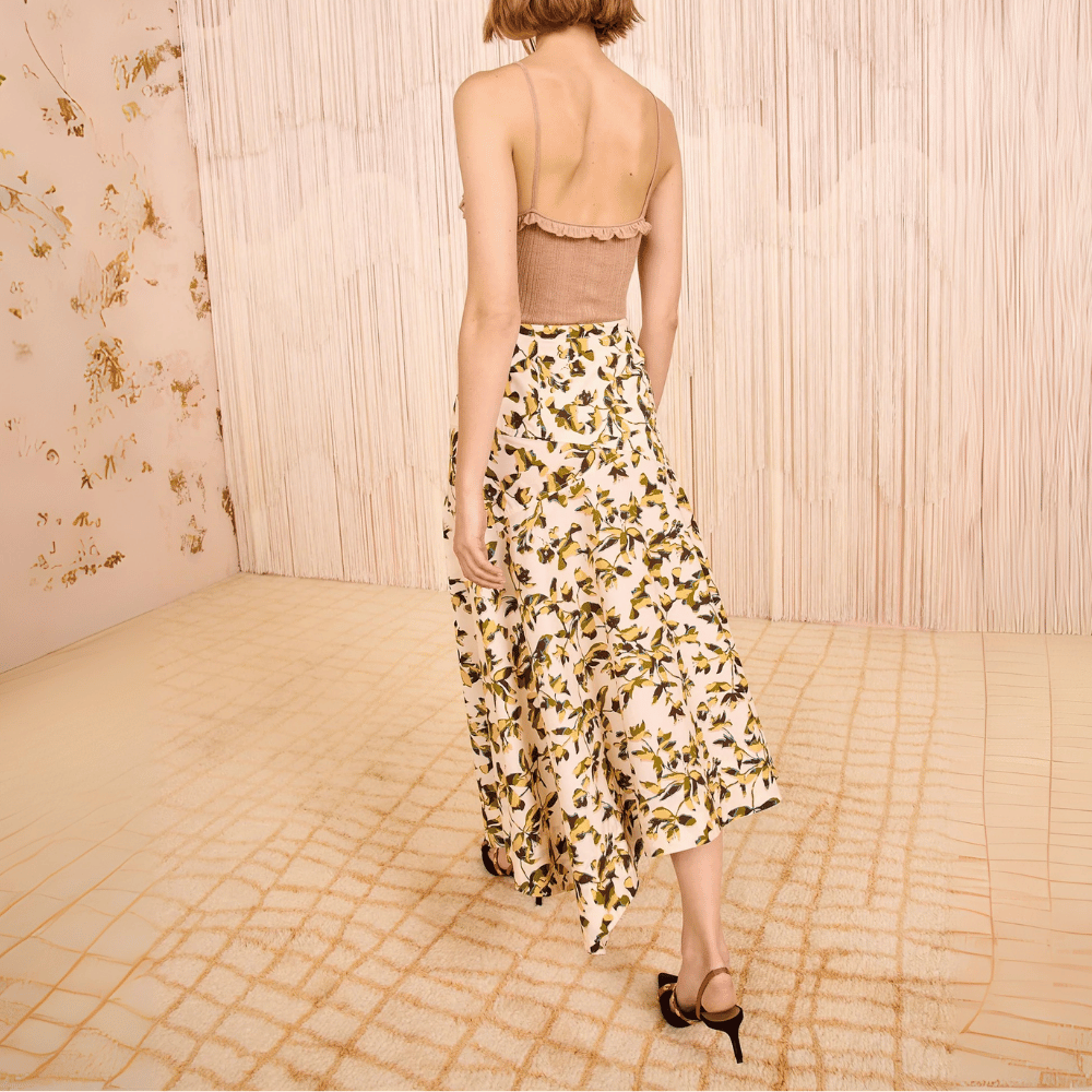 Ulla Johnson Annika High Waist Asymmetrical Midi Skirt in Lucent – luxury cotton poplin graphic bloom midi skirt with asymmetric hem, Available instore and online at Riada Concept, Woollahra Sydney’s destination for a curated selection of international luxury brands