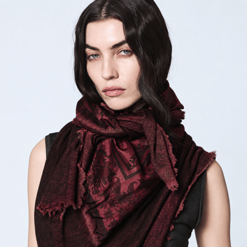 Shop Avant Toi’s hand-painted pomegranate scarf in Bordeaux at Riada Concept. Botanical silk print, soft cashmere-silk knit and distressed edges - close up