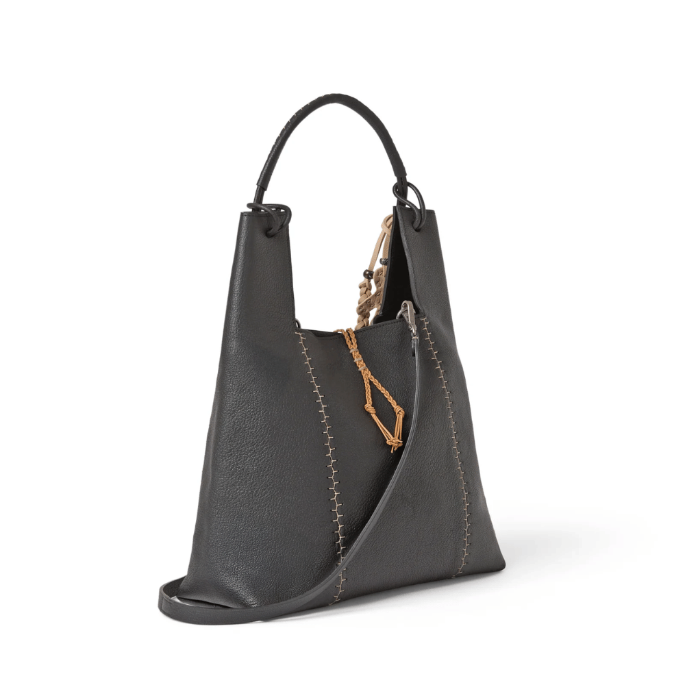 Henry Beguelin Betta Sacca M Martellato Bag in Nero calfskin with top handle, adjustable crossbody strap, and detachable pendant — handmade Italian luxury handbag available at Riada Concept official stockist of luxury labels in Sydney Australia