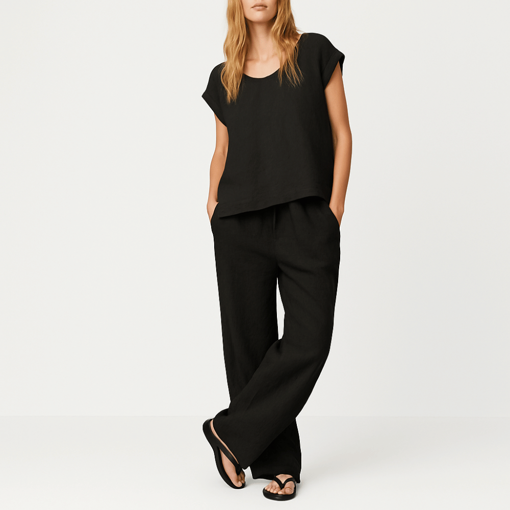 Transit Par Such Linen Cap Sleeve Top in Black — Italian-made relaxed fit linen–viscose blend top with cap sleeves and button-through back, paired with black linen pants from Riada Concept. Transit Par Such at Riada Concept Designer fashion shop online and in store High End fashion boutique Sydney Australia Riada Concept