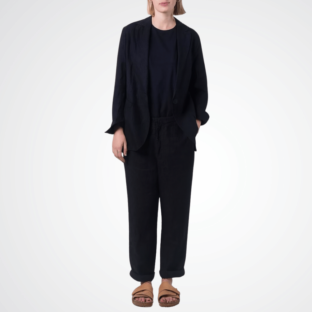 Transit Par Such Linen Slim Pant in Black — Italian-made tapered linen trousers with high waist and side pockets, styled with black blazer and sandals Transit Par Such at Riada Concept Designer fashion shop online and in store High End fashion boutique Sydney Australia Riada Concept