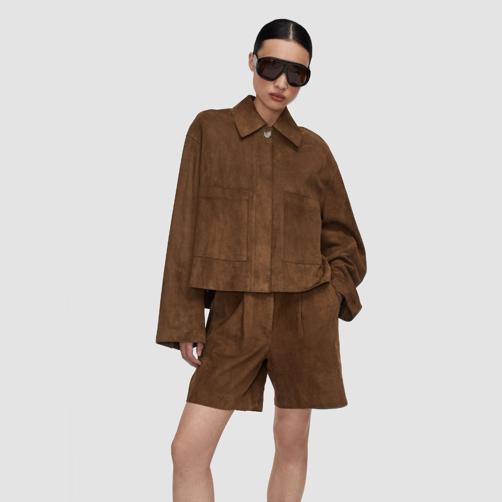 Model wearing the JOSEPH Aitna light suede jacket in taupe, three-quarter view