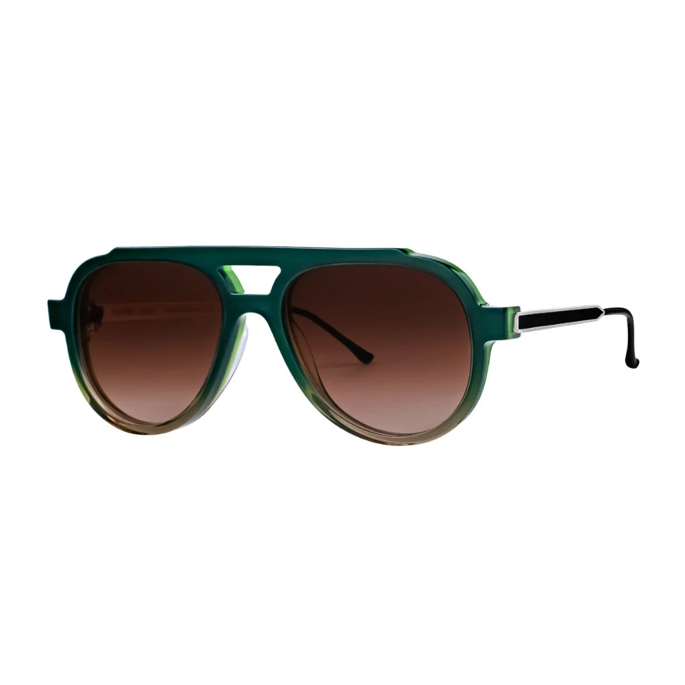 Thierry Lasry ALIENY flat-top aviator sunglasses in translucent green acetate, with gradient brown lenses and lacquered metal temples - angle view