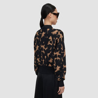 Back view of the JOSEPH Ambra tortoiseshell knit bomber jacket
