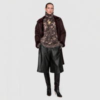 JOSEPH Asia Soft Nappa Leather Long Shorts in Black at Riada Concept. Wide-leg, knee-length lambskin - model full front view