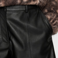 JOSEPH Asia Soft Nappa Leather Long Shorts in Black at Riada Concept. Wide-leg, knee-length lambskin - waistband and pocket close-up