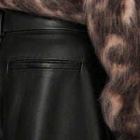 JOSEPH Asia Soft Nappa Leather Long Shorts in Black at Riada Concept. Wide-leg, knee-length lambskin - back pocket close-up