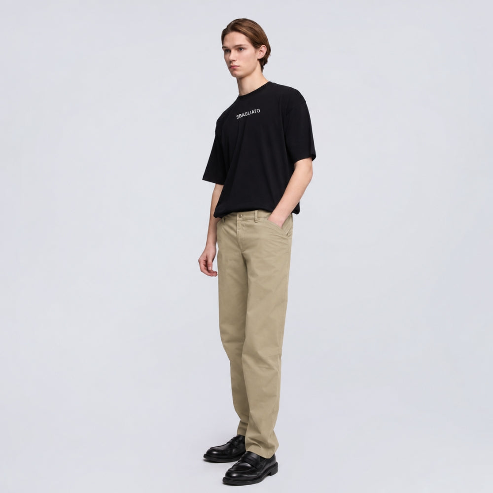 Aspesi Revisited Trekking Trousers in colonial beige worn by a model with a black T-shirt and loafers