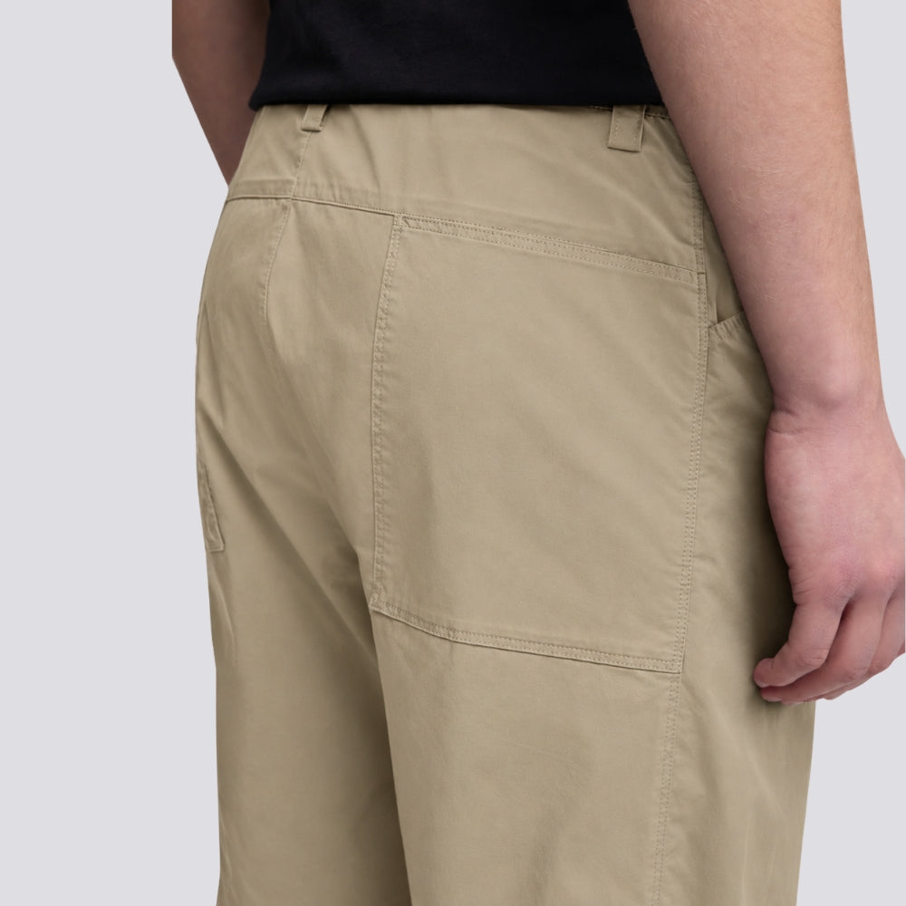 Close-up of the deep back patch pocket on the Aspesi Revisited Trekking Trousers in colonial beige