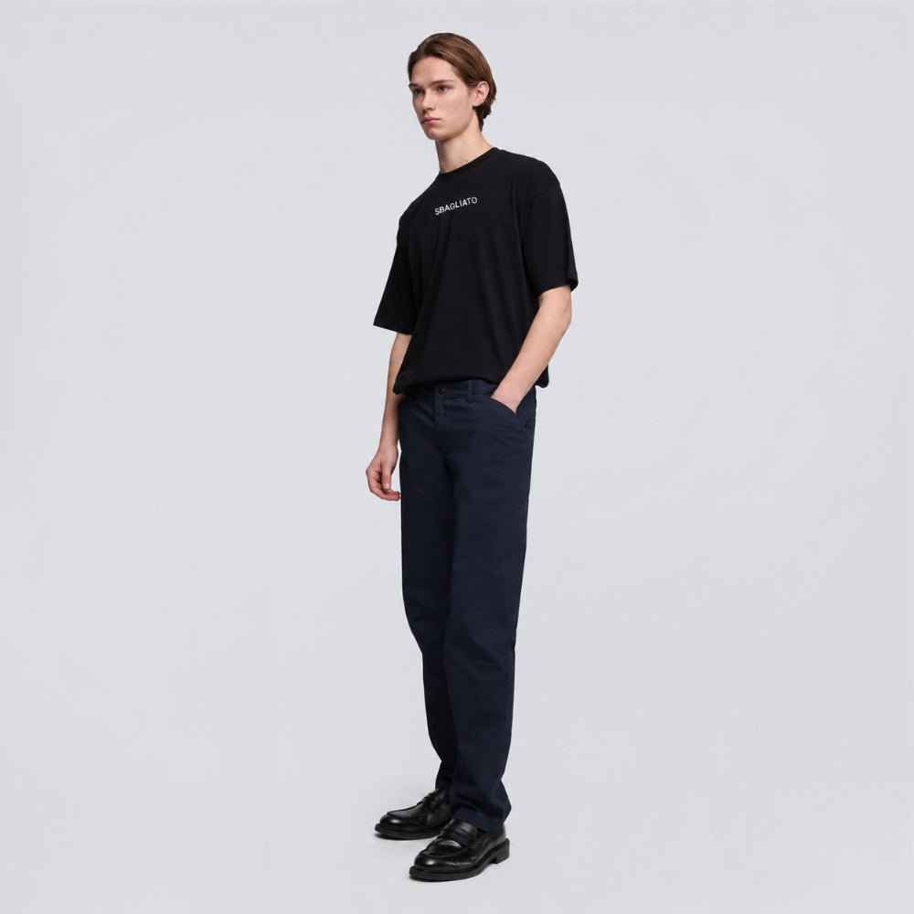 Aspesi Revisited Trekking Trousers in navy worn by a model with a black T-shirt and loafers