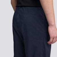 Close-up of the deep back patch pocket on the Aspesi Revisited Trekking Trousers in navy