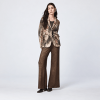 Avant Toi’s gold-laminated wool-cashmere jacket in Yak. Relaxed knit blazer with floral and needle-punched detailing - front view. Shop at Riada Concept
