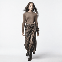 Shop Avant Toi’s hand-painted paisley scarf in Yak at Riada Concept. Warm brown cashmere-silk knit, printed silk and distressed edges - styled model, front view
