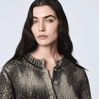 Shop Avant Toi’s laminated knit jacket in Nero. A chic collarless shape with metallic highlights and textured detailing. 