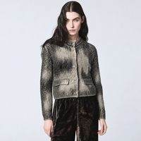 Shop Avant Toi’s laminated knit jacket in Nero. A chic collarless shape with metallic highlights and textured detailing. 