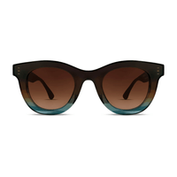 Thierry Lasry CONSISTENCY soft cat-eye sunglasses in blue green gradient acetate with brown gradient lenses, available at Riada Concept Woollahra Sydney