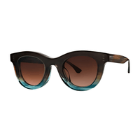 Thierry Lasry CONSISTENCY soft cat-eye sunglasses in blue green gradient acetate with brown gradient lenses, available at Riada Concept Woollahra Sydney