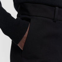 Detail of the JOSEPH Coleman Long black trousers' side pocket and waistband