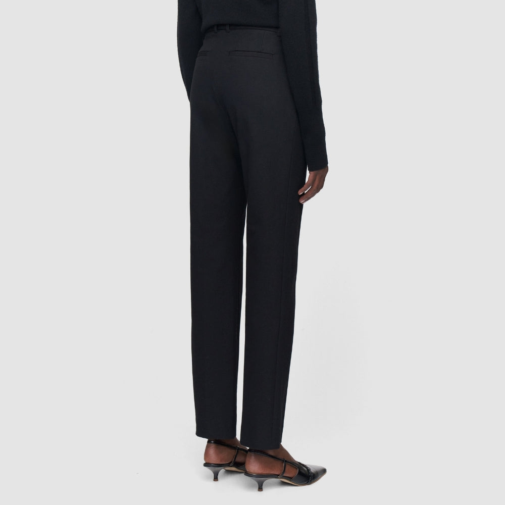 Back view of the JOSEPH Coleman Long slim black gabardine trousers with kitten heels