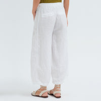 Transit Par Such cropped wide-leg trousers in white linen, with a softly dropped rise, bombé legs pleated at the hem, side pockets and an elastic back waist - back view