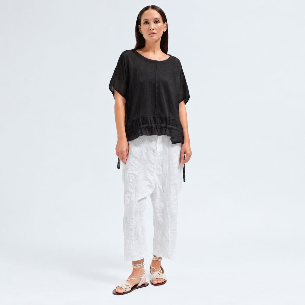 An oversized black T-shirt by Transit Par Such in crepe cotton jersey, with dropped shoulders and a cotton muslin hem band with a drawstring - full front view