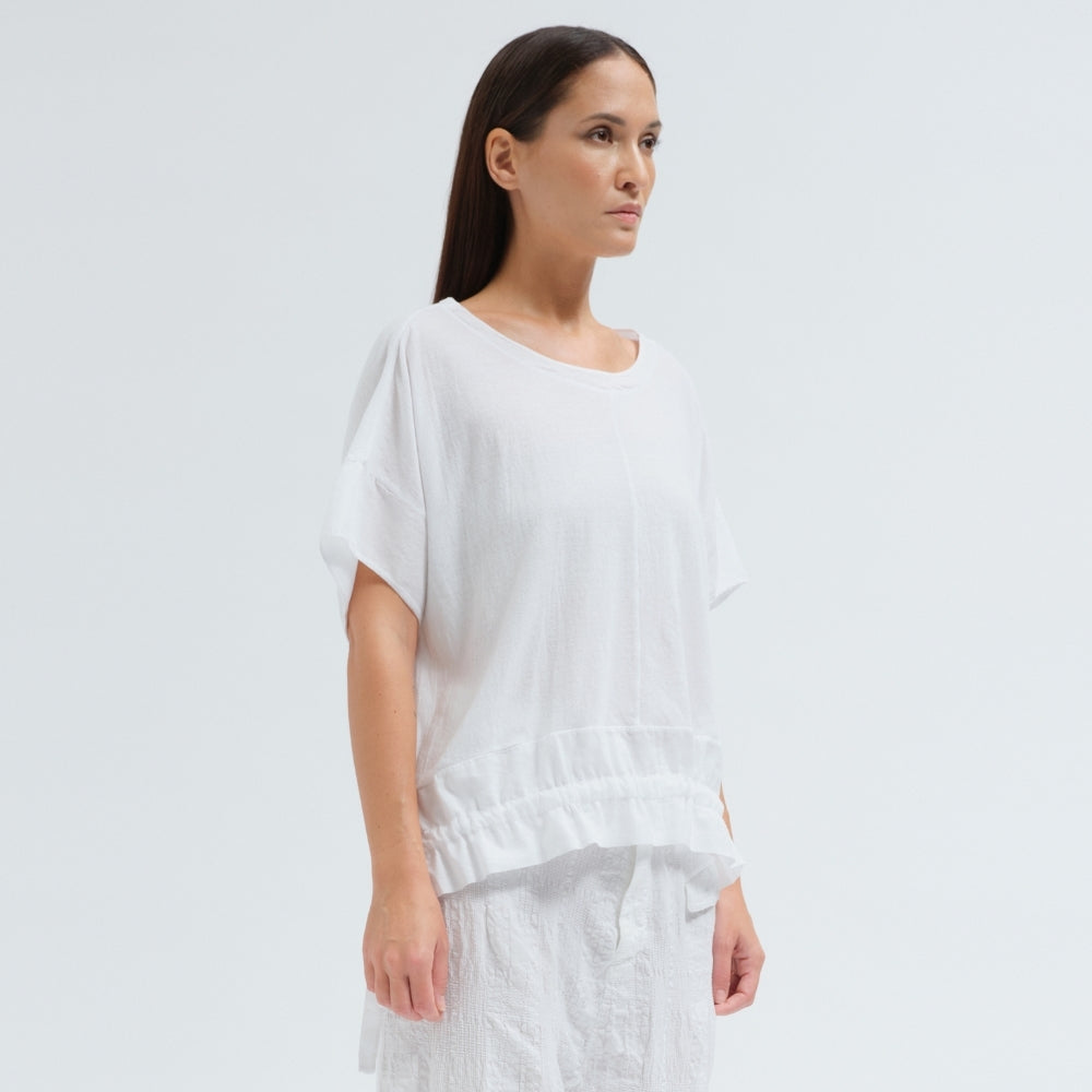 An oversized white T-shirt by Transit Par Such in crepe cotton jersey, with dropped shoulders and a cotton muslin hem band with a drawstring - angle view