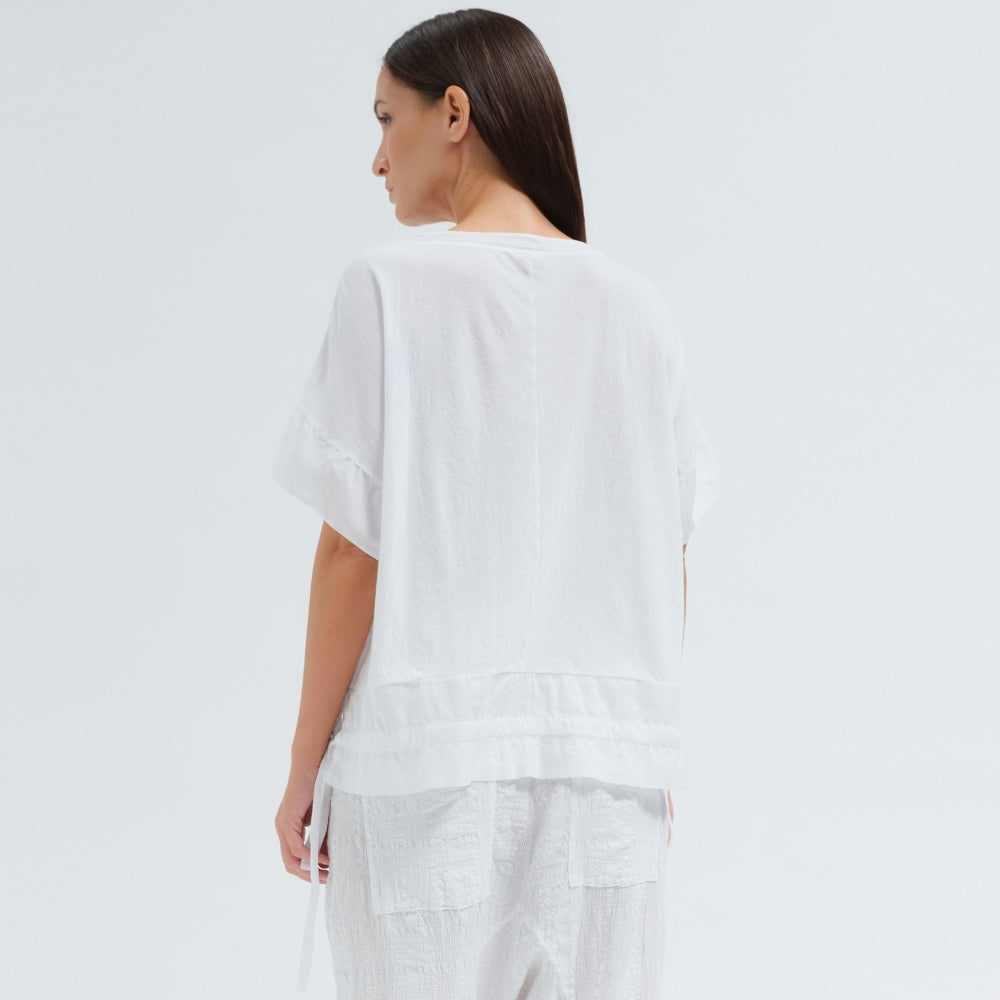An oversized white T-shirt by Transit Par Such in crepe cotton jersey, with dropped shoulders and a cotton muslin hem band with a drawstring - back view