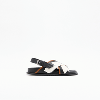 Plan C black leather Fussbett sandal side view with white flower intarsia and buckle strap
