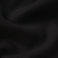 FRAME Le Sleek Straight Jeans in Black at Riada Concept. High-rise ankle-length straight jeans in super-stretch black denim - A close-up of draped black denim with soft folds and a smooth matte texture.