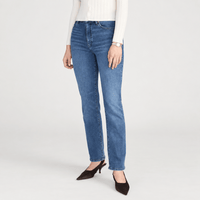 FRAME Le Sleek Straight Jeans in Ease at Riada Concept. High-rise ankle-length straight jeans in super-stretch mid-blue denim - angle view
