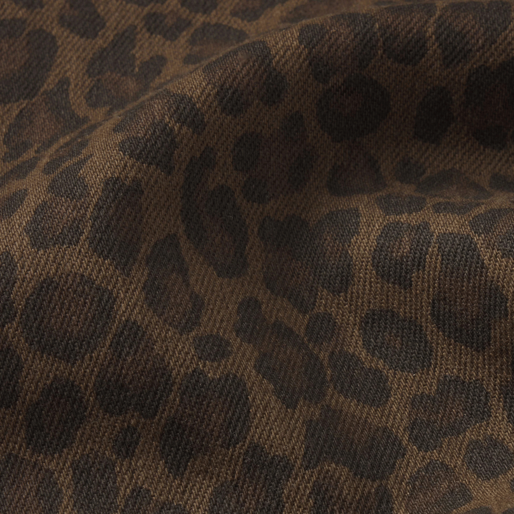 FRAME Le Slim Palazzo Jeans in Leopard at Riada Concept. High-rise wide-leg super-stretch denim in a rich brown animal print - fabric close up