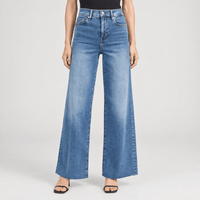 FRAME Le Slim Palazzo Raw Fray Jeans in Mermaid at Riada Concept. High-rise medium-blue wide-leg stretch denim with raw hem - front view