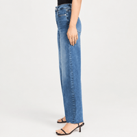 FRAME Le Slim Palazzo Raw Fray Jeans in Mermaid at Riada Concept. High-rise medium-blue wide-leg stretch denim with raw hem. - side view