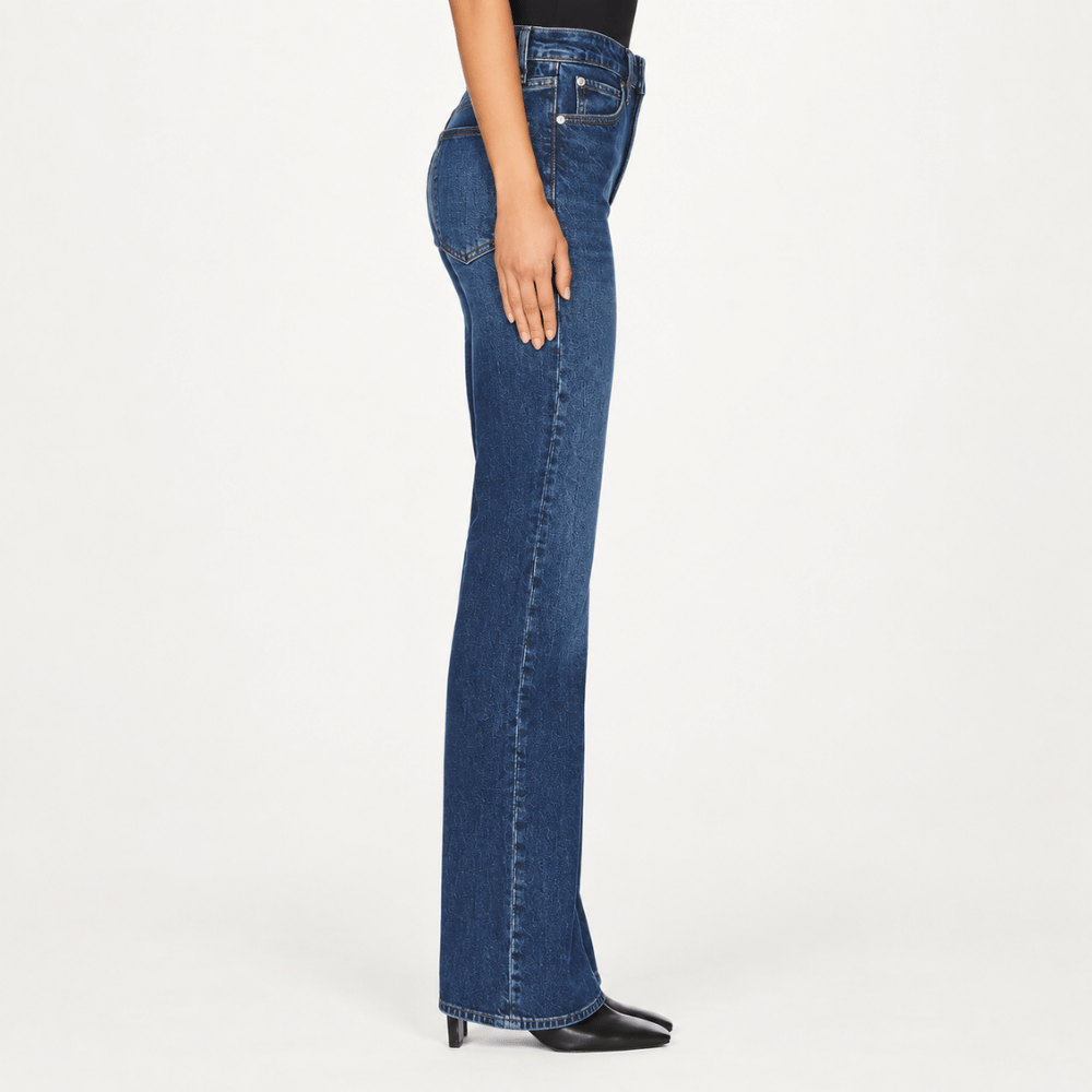 FRAME The Arrow jeans in Rival at Riada Concept. High-rise blue bootcut jeans in comfort-stretch denim with a 33-inch inseam - side view