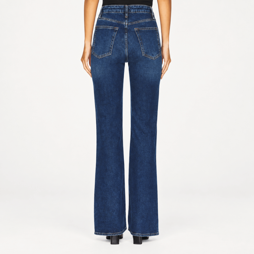FRAME The Arrow jeans in Rival at Riada Concept. High-rise blue bootcut jeans in comfort-stretch denim with a 33-inch inseam - back view