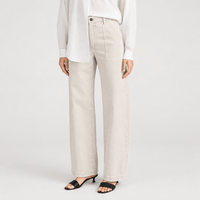 FRAME The Bow Cargo Jeans in Flax at Riada Concept. High-rise rigid denim with flat utility pockets and a sculpted barrel leg - angle view