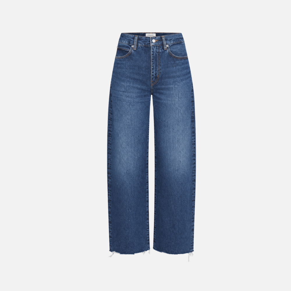 FRAME The Bow Jeans in Acumen New Fray at Riada Concept. High-rise rigid denim with a sculpted barrel leg and raw frayed hem. 