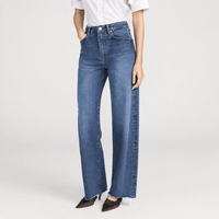 FRAME The Bow Jeans in Acumen New Fray at Riada Concept. High-rise rigid denim with a sculpted barrel leg and raw frayed hem - angle view