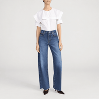 FRAME The Bow Jeans in Acumen New Fray at Riada Concept. High-rise rigid denim with a sculpted barrel leg and raw frayed hem - front model view