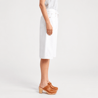 FRAME The Boy Shorts in Au Natural Clean at Riada Concept. Mid-rise long white denim shorts in rigid regenerative cotton for summer - side view