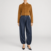 FRAME The Denim Balloon Pant in Rinse at Riada Concept. High-rise balloon jeans in fluid cotton-lyocell denim with a gathered ankle - styled model view