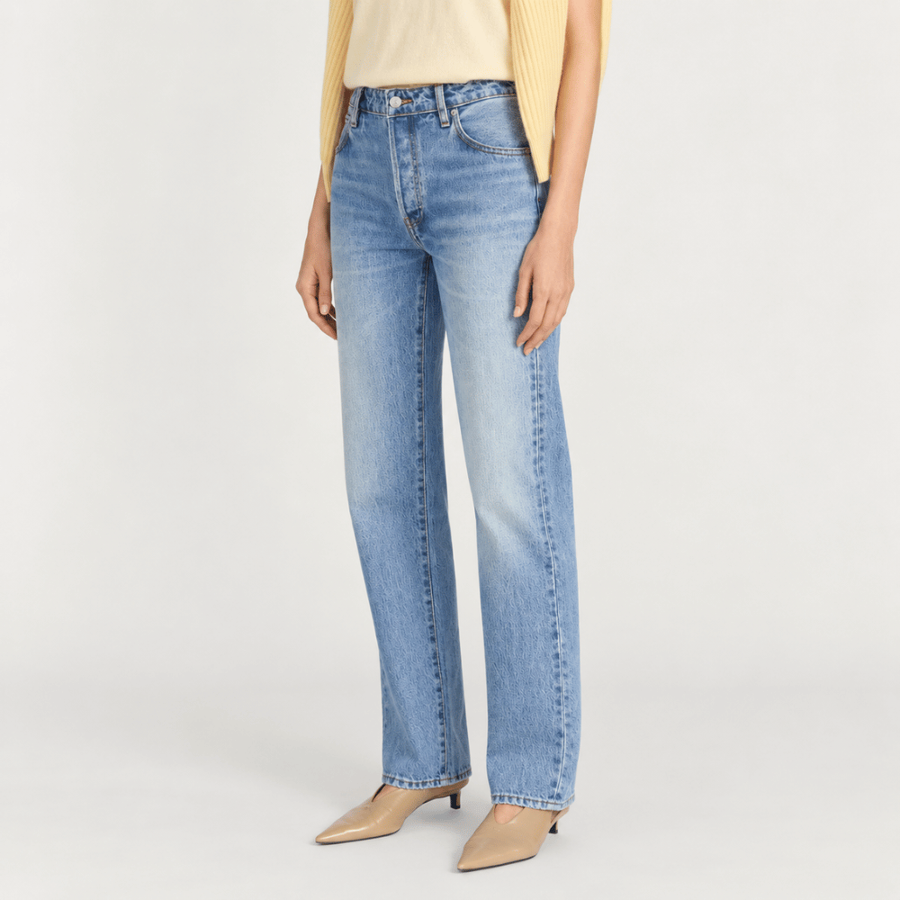 FRAME The Essential Jean in Rapture at Riada Concept. Mid-rise full-length straight jeans in rigid regenerative cotton denim - side view