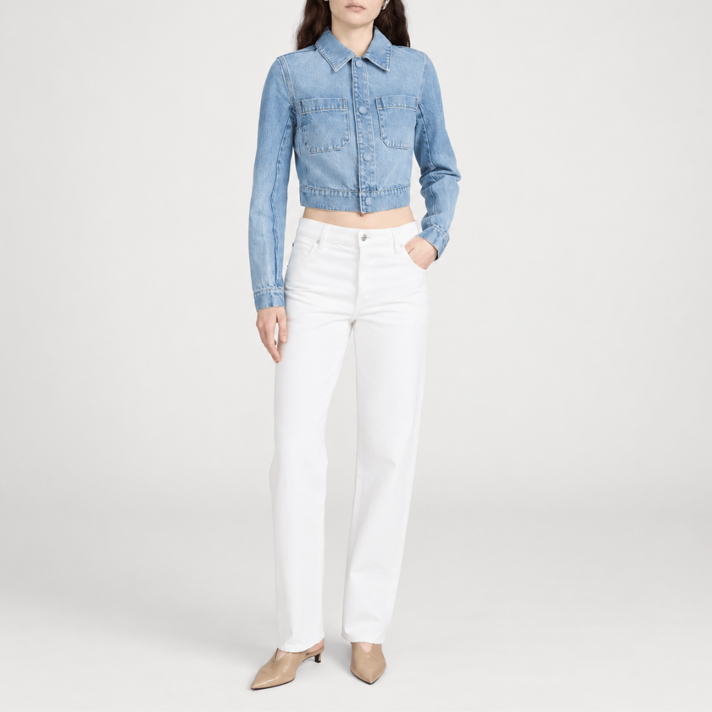 FRAME The Essential Jean in White at Riada Concept. Mid-rise full-length straight jeans in rigid regenerative cotton denim - styled model view