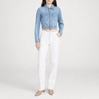 FRAME The Essential Jean in White at Riada Concept. Mid-rise full-length straight jeans in rigid regenerative cotton denim - styled model view