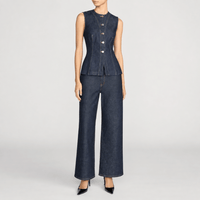 FRAME The Form Vest in Rinse at Riada Concept. Sculpted rigid indigo denim waistcoat with princess seams and silver buttons - styled full model