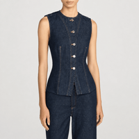 FRAME The Form Vest in Rinse at Riada Concept. Sculpted rigid indigo denim waistcoat with princess seams and silver buttons - front view