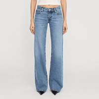 FRAME The Gray Jean in Rapture at Riada Concept. Low-rise rigid denim with a long wide-leg flare, button fly and 34-inch inseam - front view