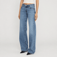 FRAME The Gray Jean in Rapture at Riada Concept. Low-rise rigid denim with a long wide-leg flare, button fly and 34-inch inseam - side view